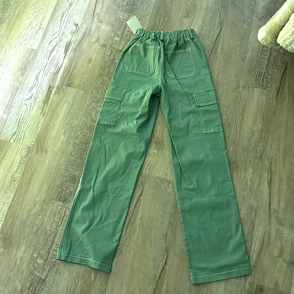 Cargo pants. Mint green color. Never worn before just not my style. Size xs